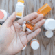 hand with a variety of vitamins